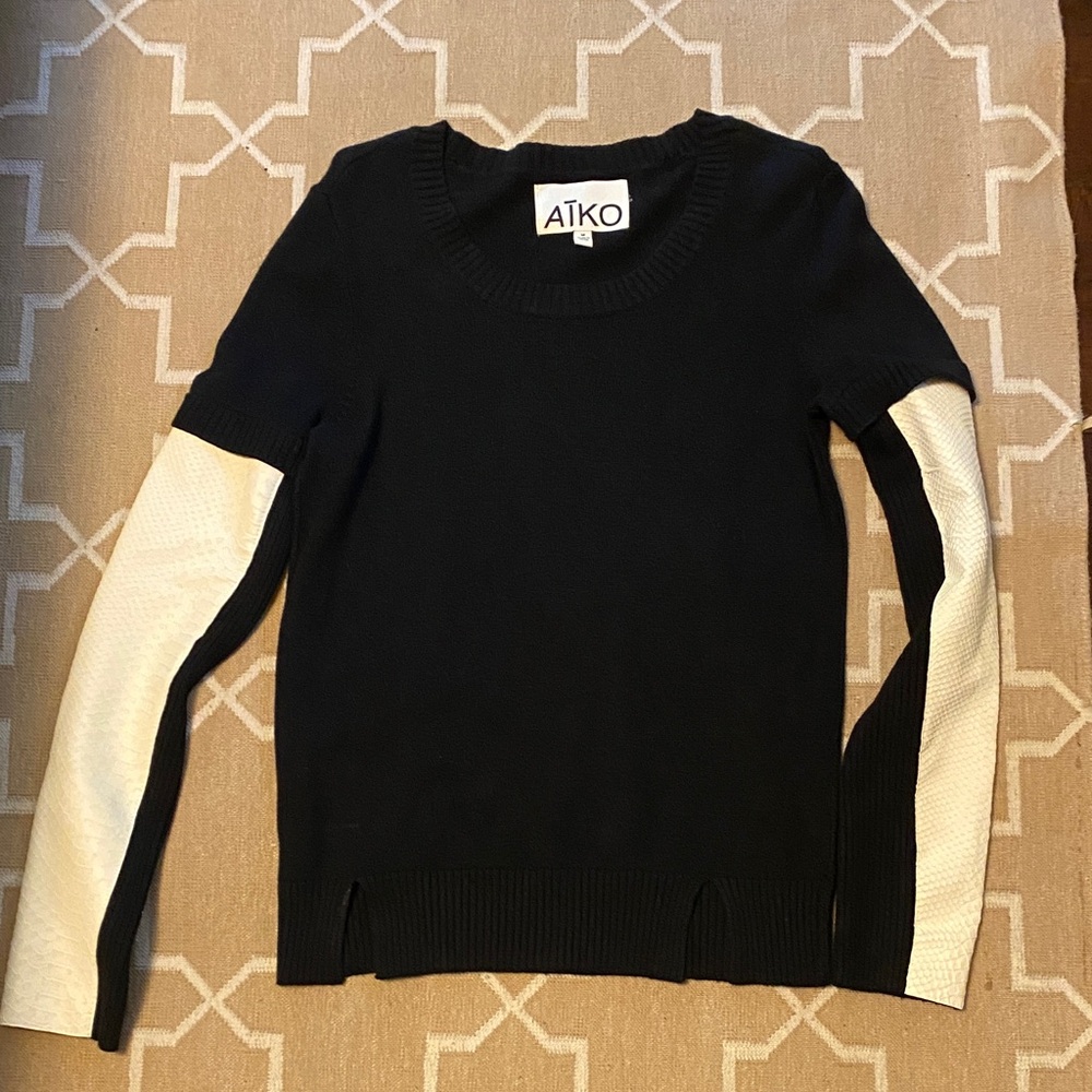 Aiko Black Sweater with White Leather Sleeves
